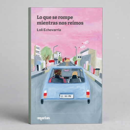 A book titled 'Lo que se rompe mientras nos reímos' by Loli Echevarría, featuring a pink watercolor sky and an illustration of a light blue car on a city street. Published by Marías.